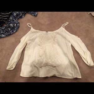 Francesca’s white cold shoulder shirt